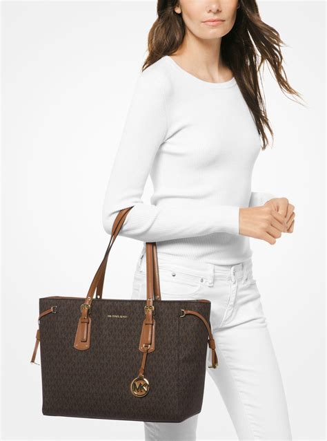 michael kors voyager medium logo tote brown|Michael Kors saffiano tote.